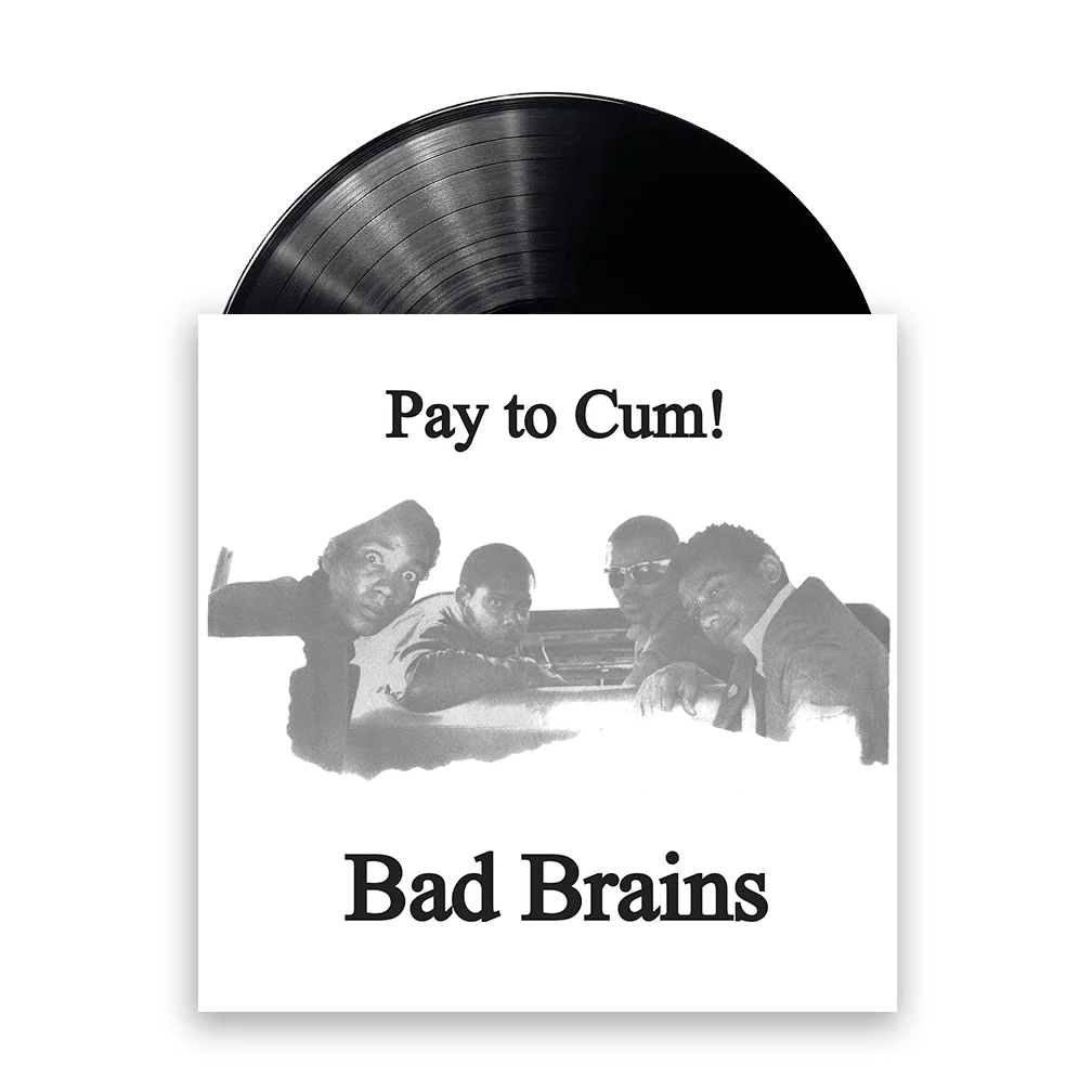 A Pay To Cum! Black 7 Inch Vinyl record is partially visible behind a cover featuring the text “Stay Close To Me,” “Pay to Cum!,” and “Bad Brains.” The cover displays a black and white photograph of four men leaning in and looking toward the camera.